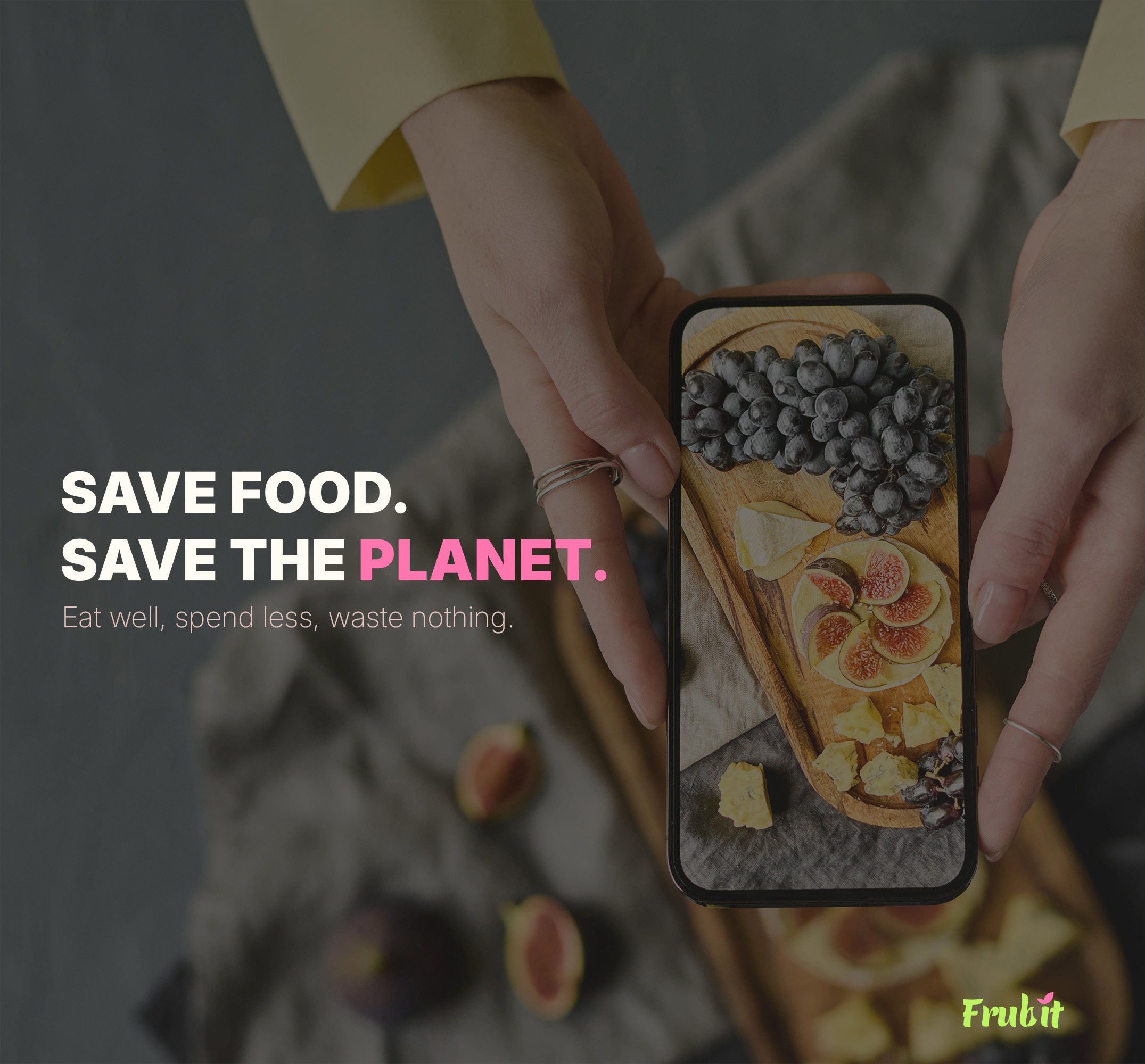 Frubit social media visual with hands holding a phone over a cheese and fig platter