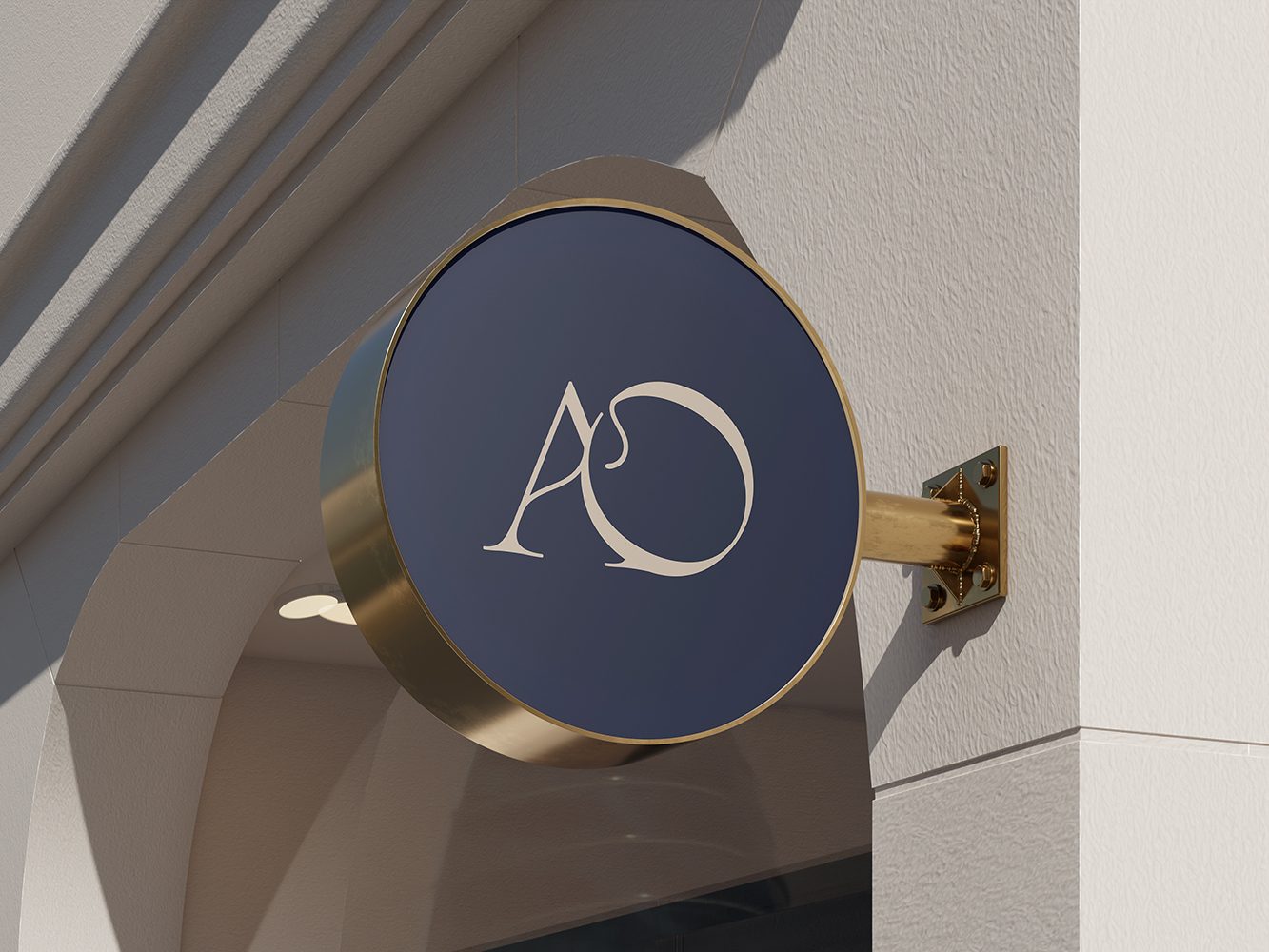 AO Clinic circular navy and gold wall sign with the AO monogram